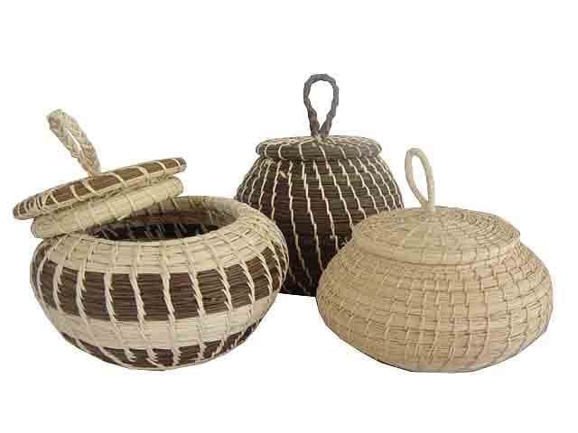 Three woven baskets in various shapes and colors.