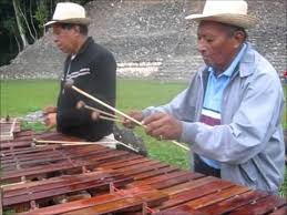 Two men playing the marimba