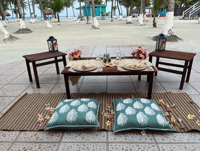 A romantic dinner set up on the beach