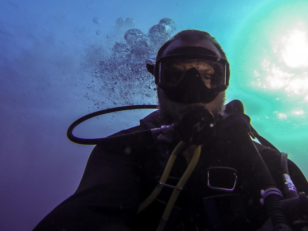 SCUBA diving near South Water Caye, Belize.