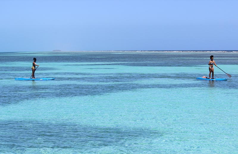 Belize island activities- paddleboarding